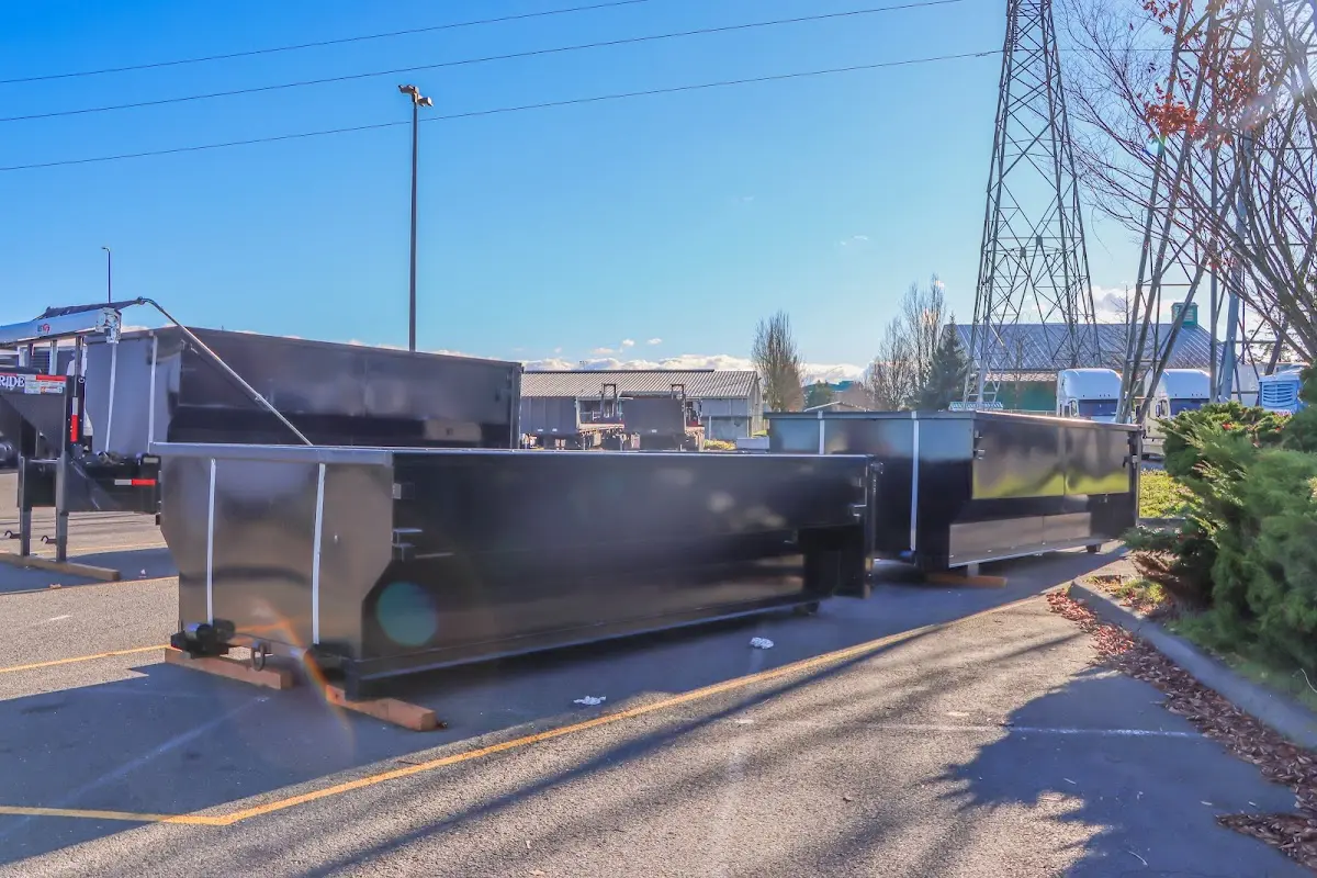 Roll-off dumpster ready for waste disposal at job site for 2 Yard Dumpster Rental in Erie